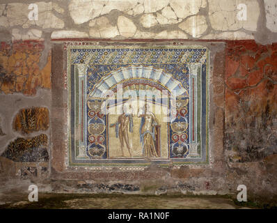 Italy. Herculaneum. Ancient Roman city destroyed by the eruption of the Vesuvius in 79 AD. Atrium of the House of Neptune and Amphitrite. 1st century. Mosaic wall of sea god Neptune with trident and his wife Amphitrite. Campania. Stock Photo