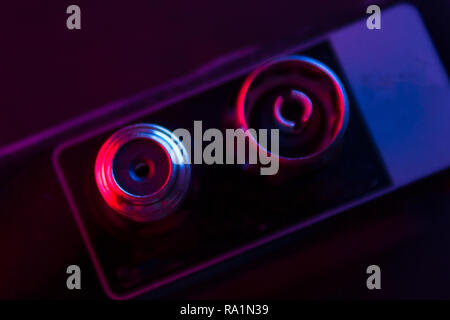close up of some electronic stuff in neon light Stock Photo