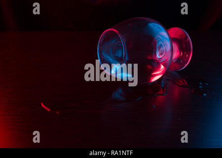 alcohol split from glass. on dark background Stock Photo