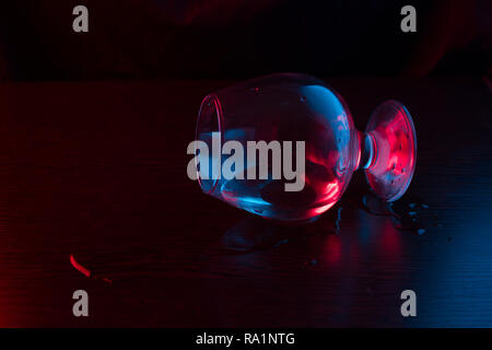 alcohol split from glass. on dark background Stock Photo