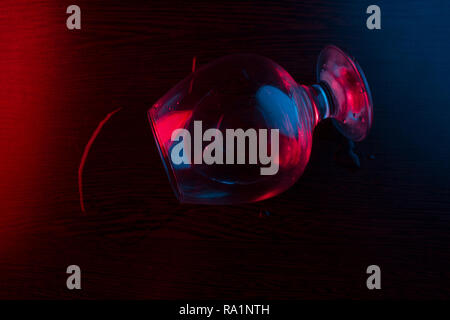 alcohol split from glass. on dark background Stock Photo