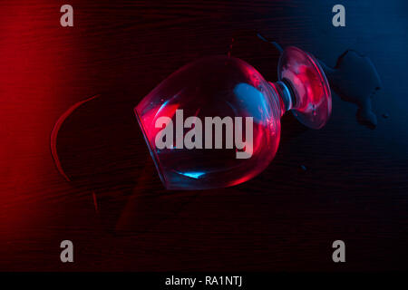 alcohol split from glass. on dark background Stock Photo