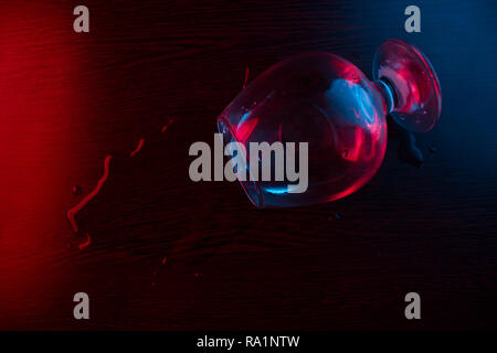 alcohol split from glass. on dark background Stock Photo