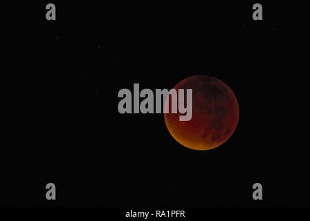 Total Lunar Eclipse of a Supermoon and Blood Moon on September 28th 2015, North Sea, Germany Stock Photo
