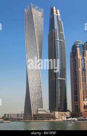 Dubai, United Arab Emirates - September 8, 2018: Cayan Tower and Damac Residenze on September 8, 2018 in Dubai Marina, Dubai, United Arab Emirates. Stock Photo