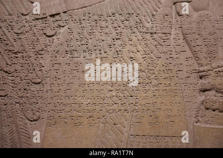 Ancient Sumerian artefacts at the british museum, London, showing cuneiform text and writing from the ancient assyrian region now iraq. Stock Photo