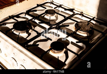 Old stove burner grates Stock Photo - Alamy