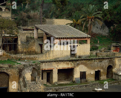 Italy. Herculaneum. Ancient Roman city destroyed by the eruption of the Vesuvius in 79 AD. House of the Gem (Casa della Gemma). Located at the southern end of Cardo V. Two-story house. General view. Campania. Stock Photo