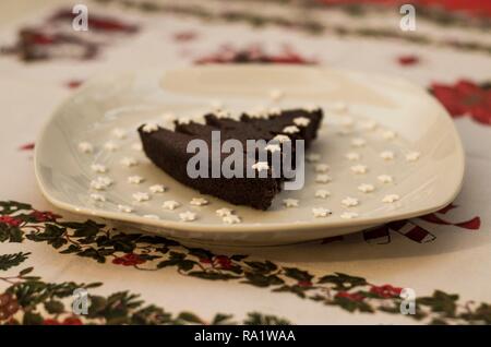 Christmas tree shaped chocolate cake with sugar stars Stock Photo