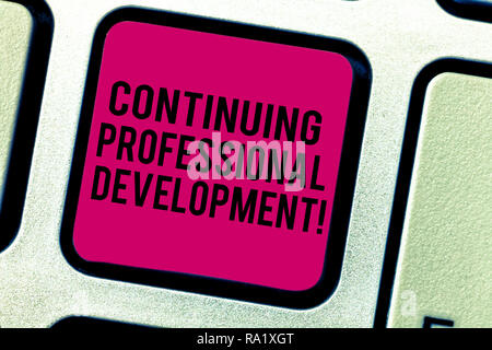 Text sign showing Continuing Professional Development. Conceptual photo Maintaining and enhancing the knowledge Keyboard key Intention to create compu Stock Photo