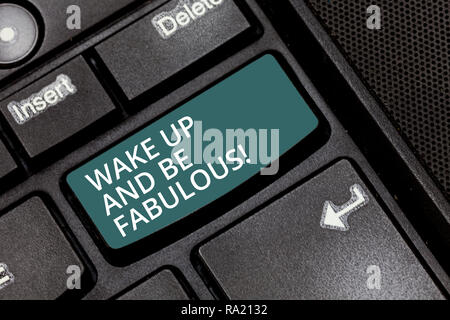 Text sign showing Wake Up And Be Fabulous. Conceptual photo Motivation inspiration encouragement for being great Keyboard key Intention to create comp Stock Photo
