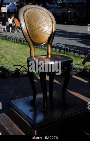 Ukraine. Odessa. The Twelve Chairs, novel monument. Satirical novel by Odessan Soviet authors Ilia Ilf (1897-1937) and Yevgeni Petrov (1903-1942), 1928. Deribassovskaya street. Stock Photo