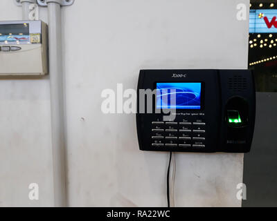 BEKASI, WEST JAVA, INDONESIA. JANUARY, 3 2019 : Fingerprint scanner on wall for unlock door security system. The fingerprint scanner control machine Stock Photo