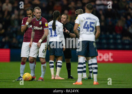 Referee Geoff Eltringham speaks with Preston North End's Daniel Johnson  29th December 2018, Deepdale, Preston, England; Sky Bet Championship, Preston North End vs Aston Villa ;    Credit: Terry Donnelly/News Images  English Football League images are subject to DataCo Licence Stock Photo