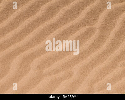 Golden sand texture and pattern Stock Photo