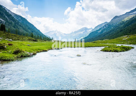 calm waters in an alpine river Stock Photo