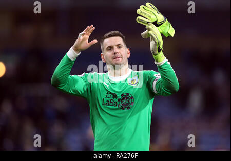 Burnley goalkeeper Thomas Heaton celebrates after the final whistle during the Premier League match at Turf Moor, Burnley. Stock Photo