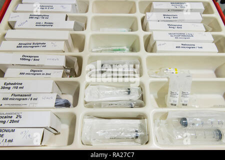 Drawer in a hospital crash trolley for emergency resuscitation containing drugs. Stock Photo