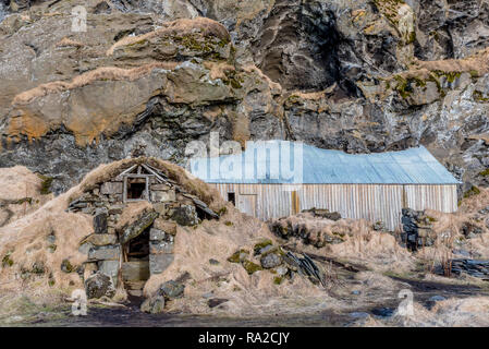 The old, traditional turf houses at Drangurinn in Drangshlid, Iceland, mythical “elf houses” Stock Photo