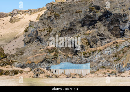 The old, traditional turf houses at Drangurinn in Drangshlid, Iceland, mythical “elf houses” Stock Photo