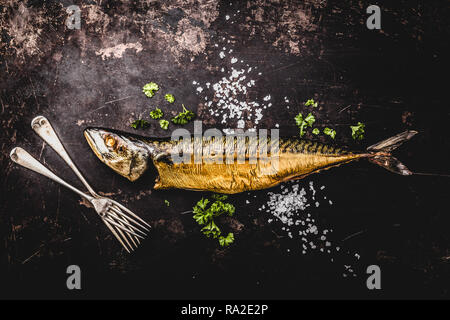 Smoked mackerel on wooden background Stock Photo