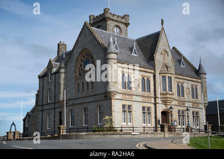 The town hall of Lerwick, Mainland, Shetland Islands, an imposing building built in the 19th century with a clock tower and neo-Gothic features Stock Photo