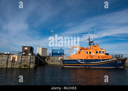 Fishing boat docked in the harbor of Lerwick, Mainland, Shetland Islands, Scotland on a bright sunny day Stock Photo