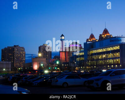Various shots of Toronto taken during the blue hour. The blue sky is contrasted against the warm glow of the city's lights. Stock Photo