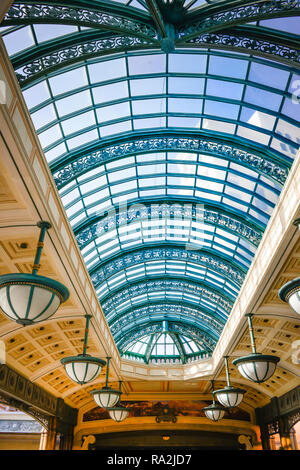 Beautiful entrance to the Bellagio Hotel and Casino with valet parking underneath this oxidized copper framework and glass sculpted skylight in verdig Stock Photo