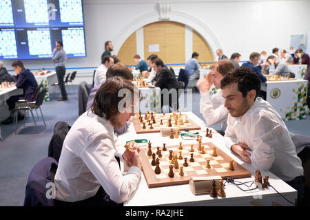 St. Petersburg, Russia - December 28, 2018: Men compete in the final round of King Salman World Rapid Chess Championship 2018. The tournament is held  Stock Photo