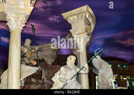 Cropped close up of the Neptune Fountain with marble statues of Neptune and Jupiter inside Caesars Palace Forum Shops mall in Las Vegas, NV Stock Photo