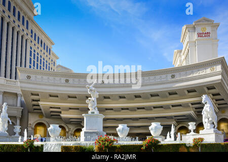 The opulent entrance to Caesars Palace Hotel and Casino with white marble statuary and fountains on the Strip in Las Vegas, NV Stock Photo