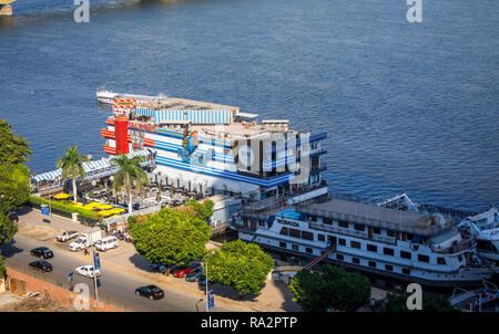 Floating restaurants, TGI Fridays, Grand Cafe and Fish Market, on boats moored on the banks of River Nile, Giza, Cairo, Egypt, Stock Photo