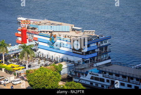 Floating restaurants, TGI Fridays, Grand Cafe and Fish Market, on boats moored on the banks of River Nile, Giza, Cairo, Egypt, Stock Photo