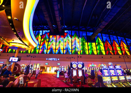 Buffalo, USA-20 July, 2018: Modern casino hall with slot machines, roulette and blackjack tables Stock Photo