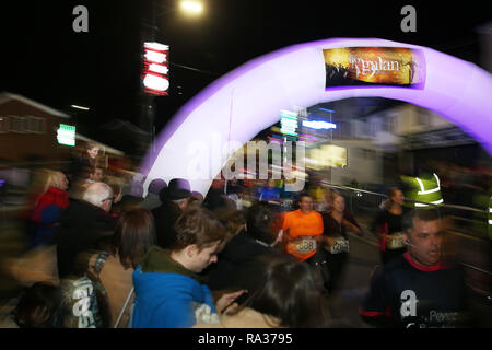 Mountain Ash, Wales, UK 31st December 2018. Nos Galan 2018 road races, Mountain Ash in South Wales on Monday 31st December 2018. this is the 60th anniversary race of the event Credit: Andrew Orchard/Alamy Live News Stock Photo