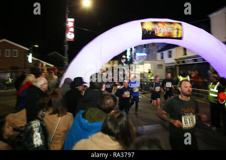 Mountain Ash, Wales, UK 31st December 2018. Nos Galan 2018 road races, Mountain Ash in South Wales on Monday 31st December 2018. this is the 60th anniversary race of the event Credit: Andrew Orchard/Alamy Live News Stock Photo