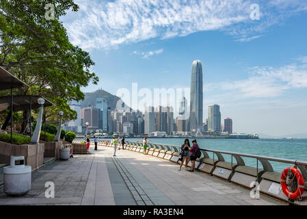 The towers of Central District in Hong Kong stand out against a blue November sky Stock Photo