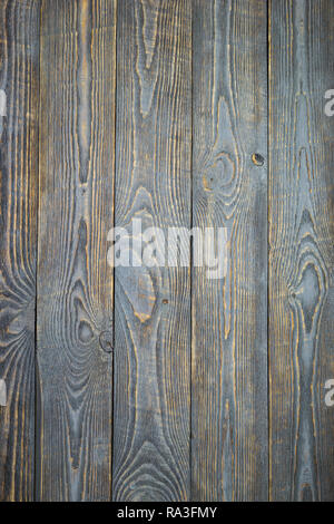 Background of natural wooden textured boards with traces of gray paint. Vignetting Stock Photo