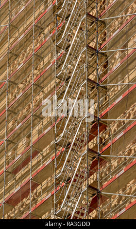 SEVILLE SPAIN SCAFFOLDING AND LADDERS ON THE SIDES OF THE GIRALDA BELL TOWER Stock Photo