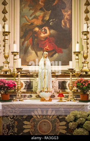 Altar with a Madonna in Chiesa di Ognissanti church in Florence, Italy Stock Photo
