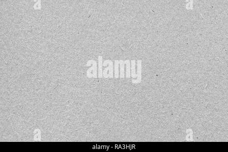 Grey horizontal rough note paper texture, dark background for text Stock Photo