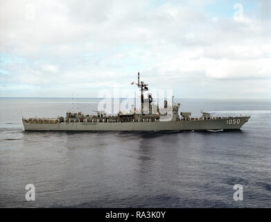 1977 -An aerial starboard beam view of the frigate USS ALBERT DAVID (FF 1050) underway near San Diego, California. Stock Photo