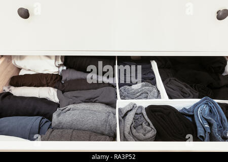 organised clothes in a drawer Stock Photo