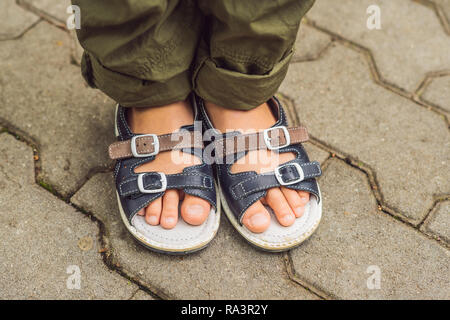 children's orthopedic shoes on the boy's feet Stock Photo