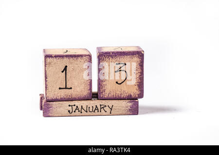 Colorful Wooden Block Perpetual Calendar Showing January 13th Stock Photo