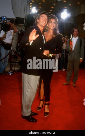 WESTWOOD, CA - JULY 8: Actor Jean-Claude Van Damme and model Darcy