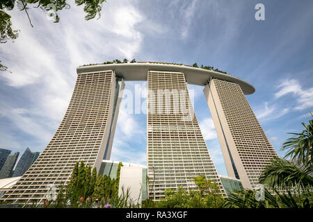 Singapore - December 2016: Marina Bay Sands hotel in Singapore, blue sky and clouds Stock Photo