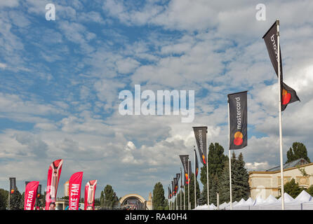 KIEV, UKRAINE - JULY 07, 2018: Mastercard credit card banners against blue sky at the Atlas Weekend music festival in National Expocenter. Stock Photo