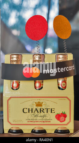 KIEV, UKRAINE - JULY 08, 2018: Artwinery Charte sparkling wine bottles with Mastercard cup at Atlas Weekend Festival in National Expocenter. Atlas Wee Stock Photo